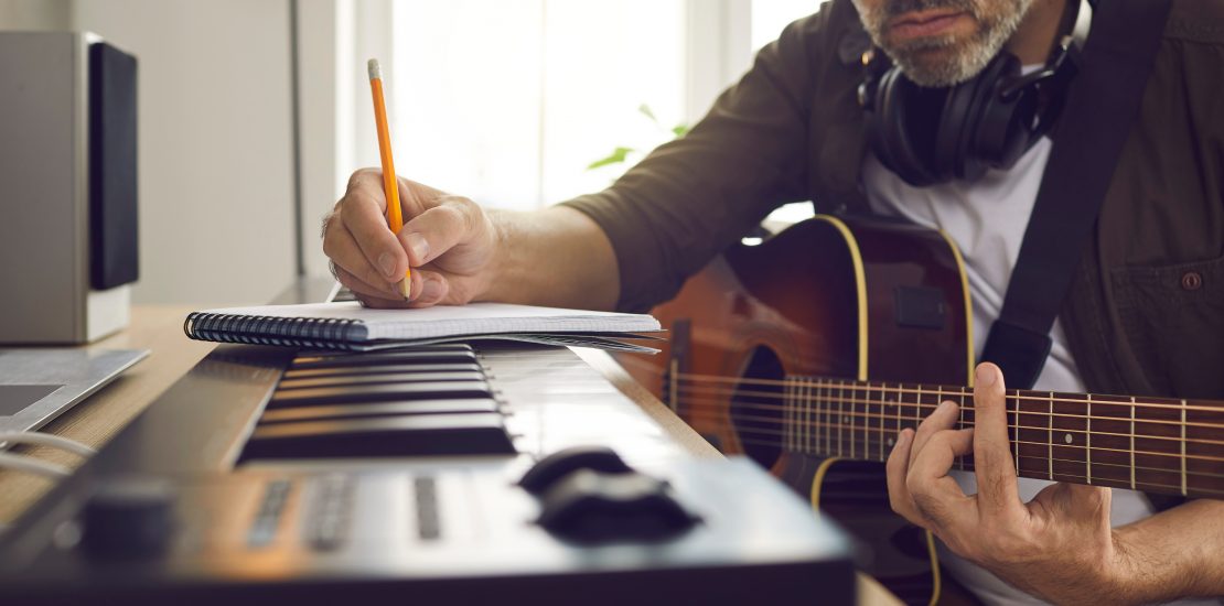 Musician writing music.