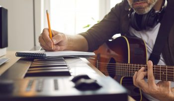 Musician writing music.