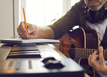 Musician writing music.